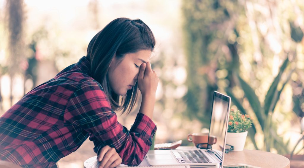 An image of a person who is struggling to stay motived during a job search