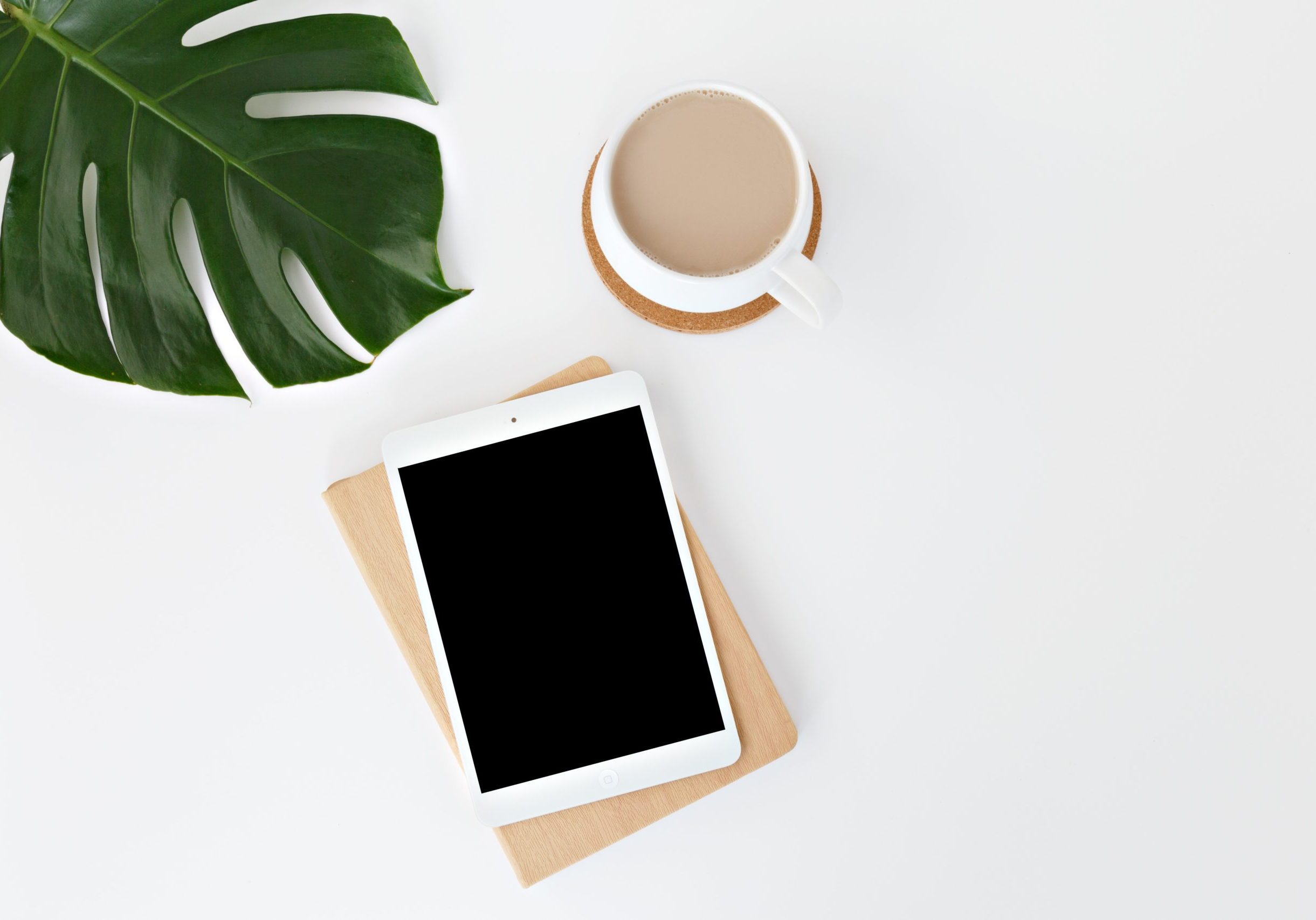 white iPad on white surface