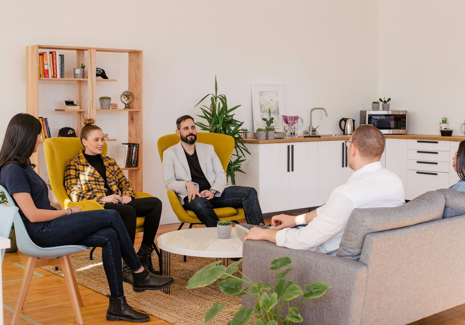 people seated in living room