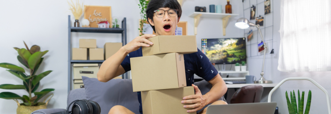 Man juggling with boxes