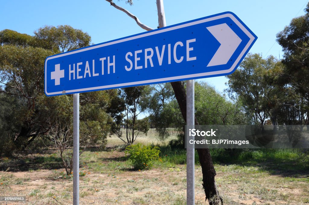 Directional road sign, to health services, small rural Outback town in Western Australia