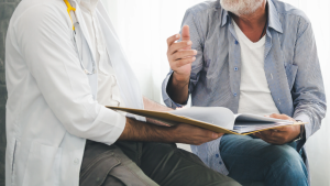 Psychiatrist consulting with a patient during a clinical appointment