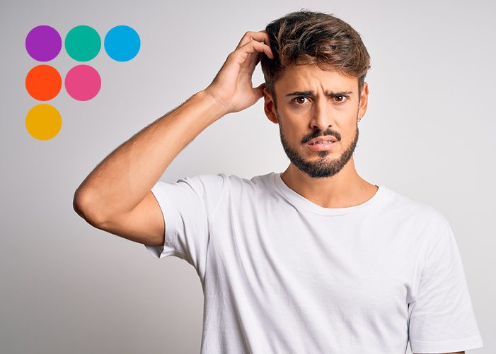 Man looking confused scratching his head