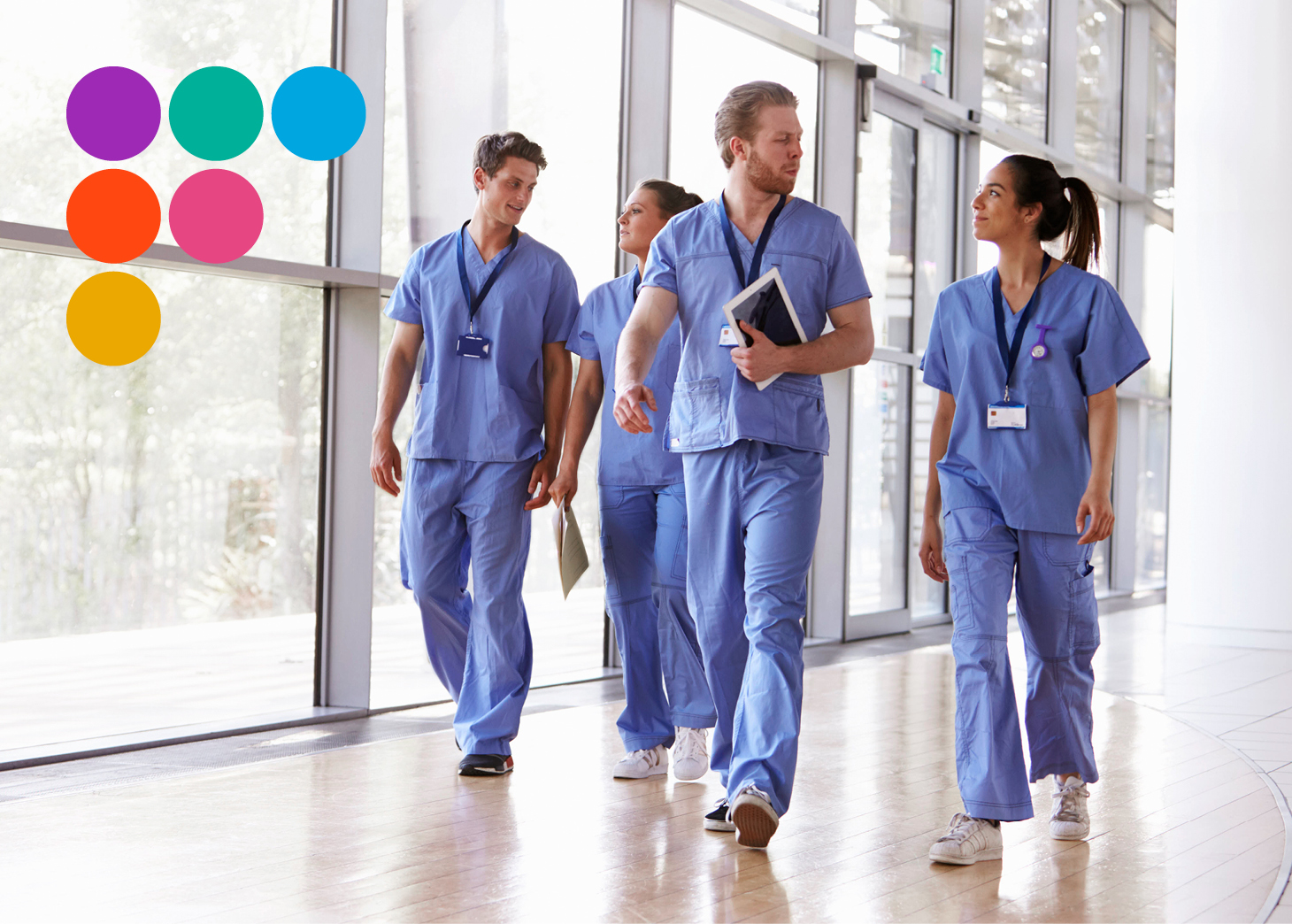 Four doctors walking down the hall