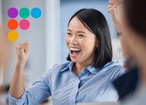 A woman looking happy, thriving at work!