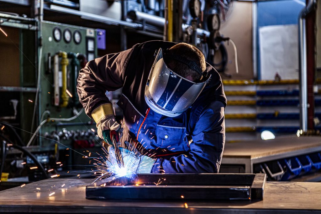 Boilermaker Welder performing metal fabrication and welding work inside an Australian manufacturing workshop.