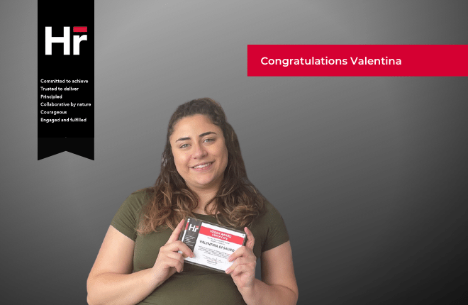 Horner Tullamarine's Recruitment Consultant Valentina Di Sauro holding her plaque as Horner's quarterly internal award winner