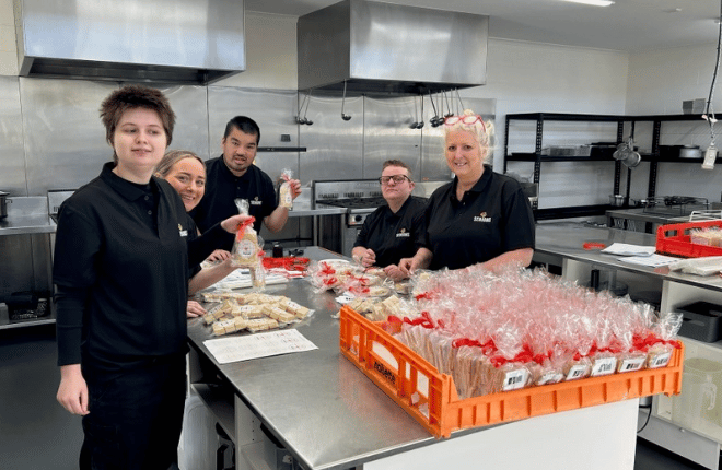 People with disability at Seasons making Christmas shortbread for Horner candidates