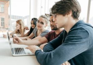 Balancing Efficiency and Fairness in Group Activities during High-Volume Hiring and Graduate Recruitment - People working