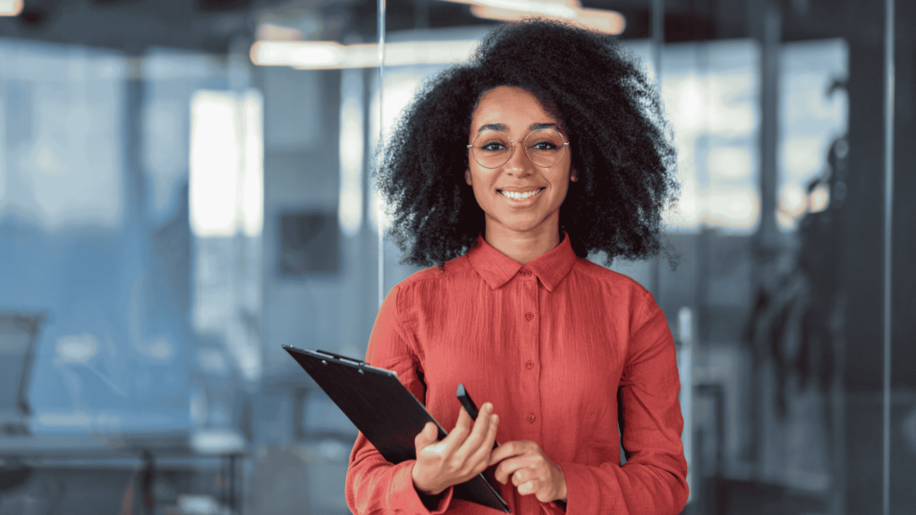 portrait-of-young-beautiful-female-financier-in-red