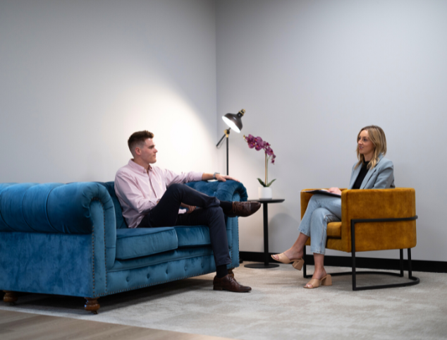 Our National Manager of Supply Chain - Kate Thomas with Principal Recruitment Consultant - Kevin McCormack, discussing new strategies on the iconic Miller Leith sofa