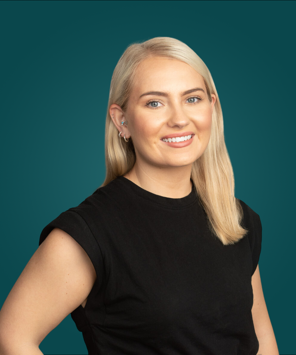 Dark headshot of our HR, Business Support & Finance - Contracting & Compliance recruitment consultant within FMCG & retail based in Melbourne, Erica O'Connor