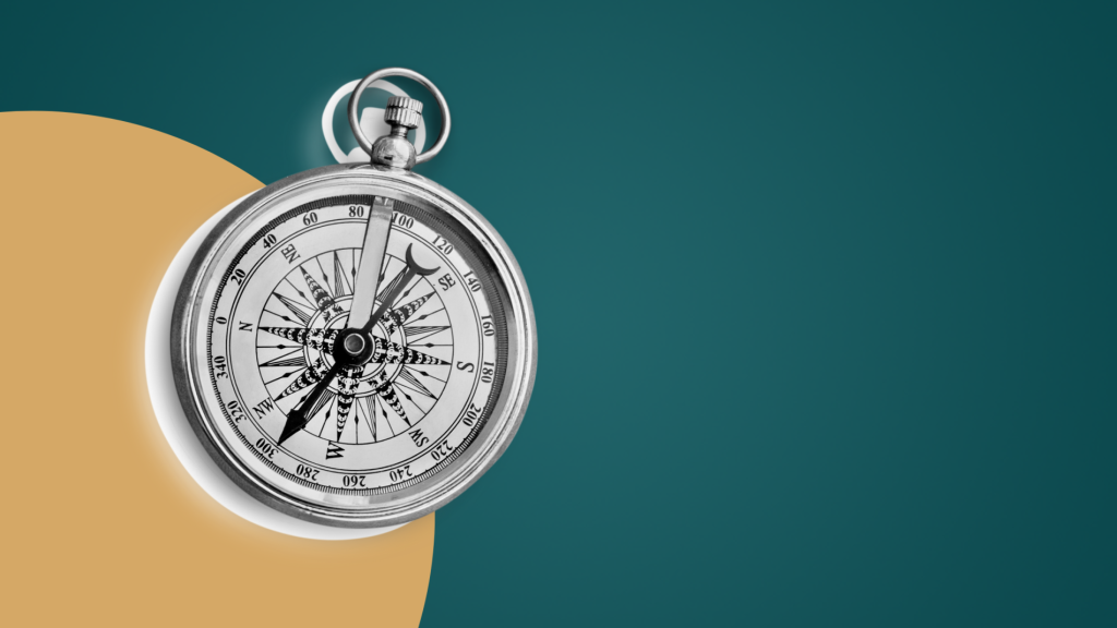 Black and white photo of a compass