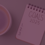 Picture of 2025 Goals with a pen, coffee and a plant.