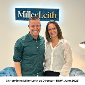 Stephen and Christy in front of the Miller Leith sign