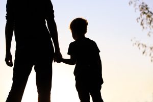 Mother and Son holding hands