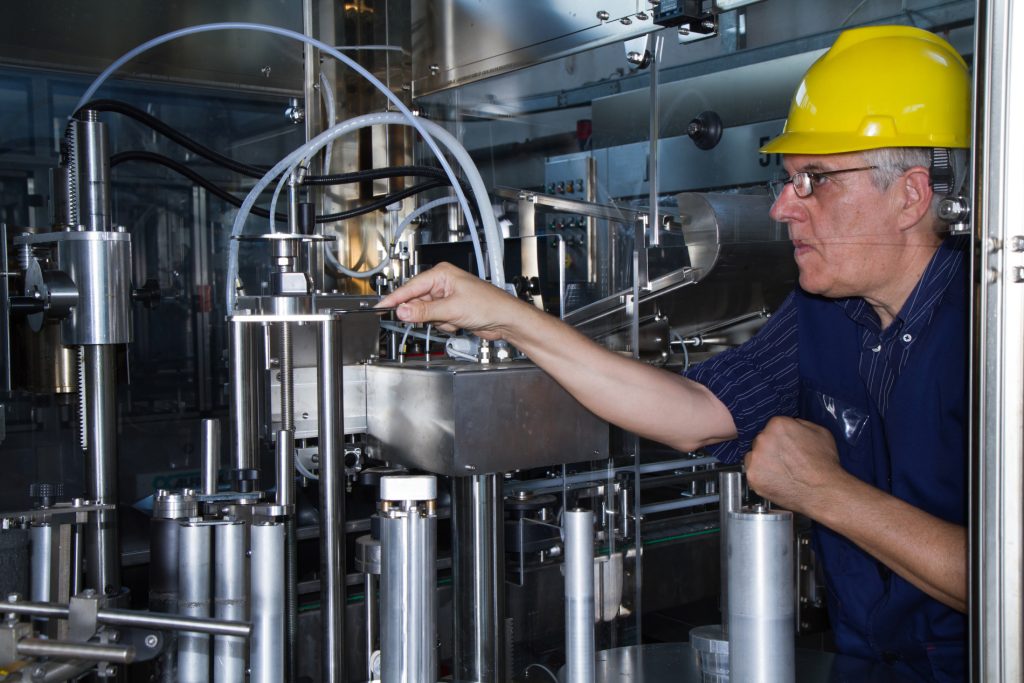 maintenance fitter repairing machinery