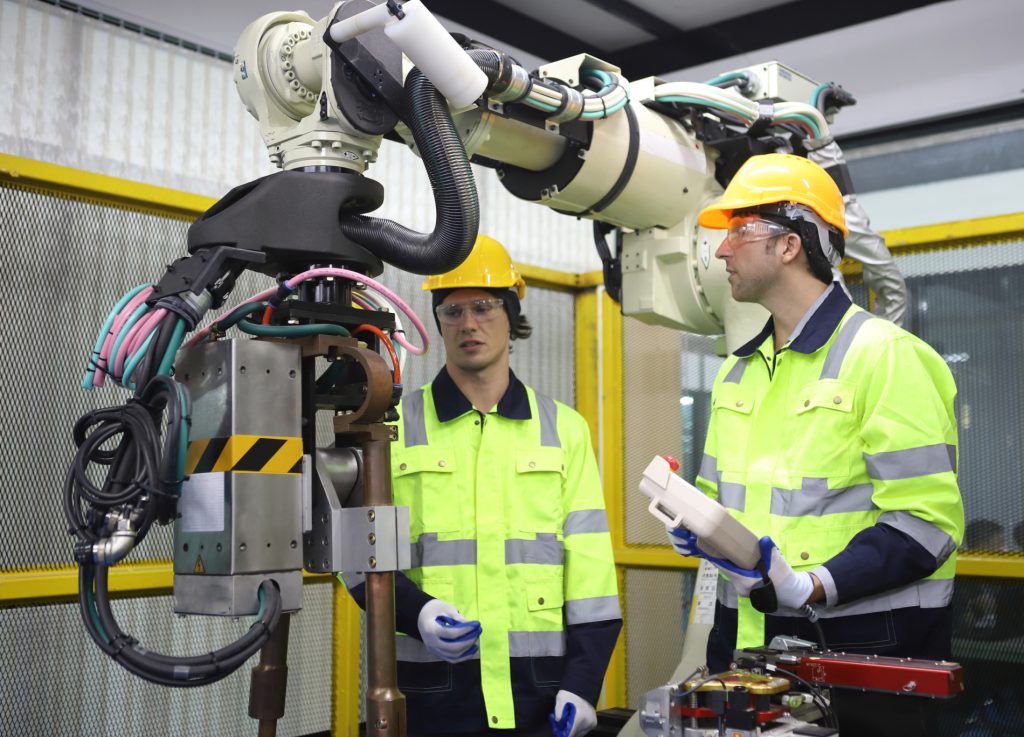 automation engineers working on robots