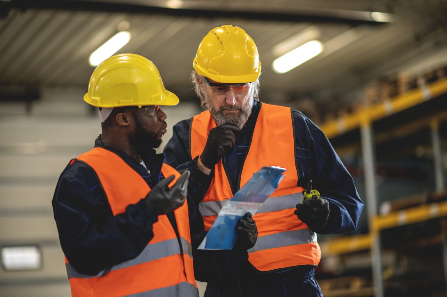 iStock-1366145331 tradesman and trade assistant Skilled trades contractors on-site completing mechanical work