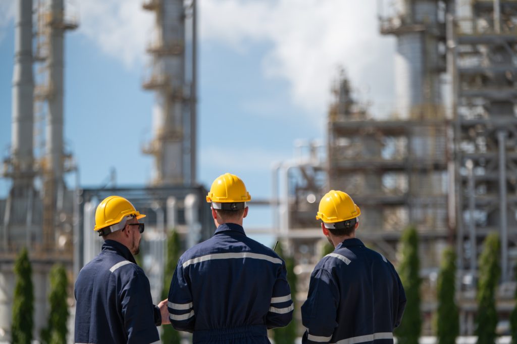 Refinery industry, engineer working in industrial production, oil and gas refinery plant industry factory, Petrochemical plant