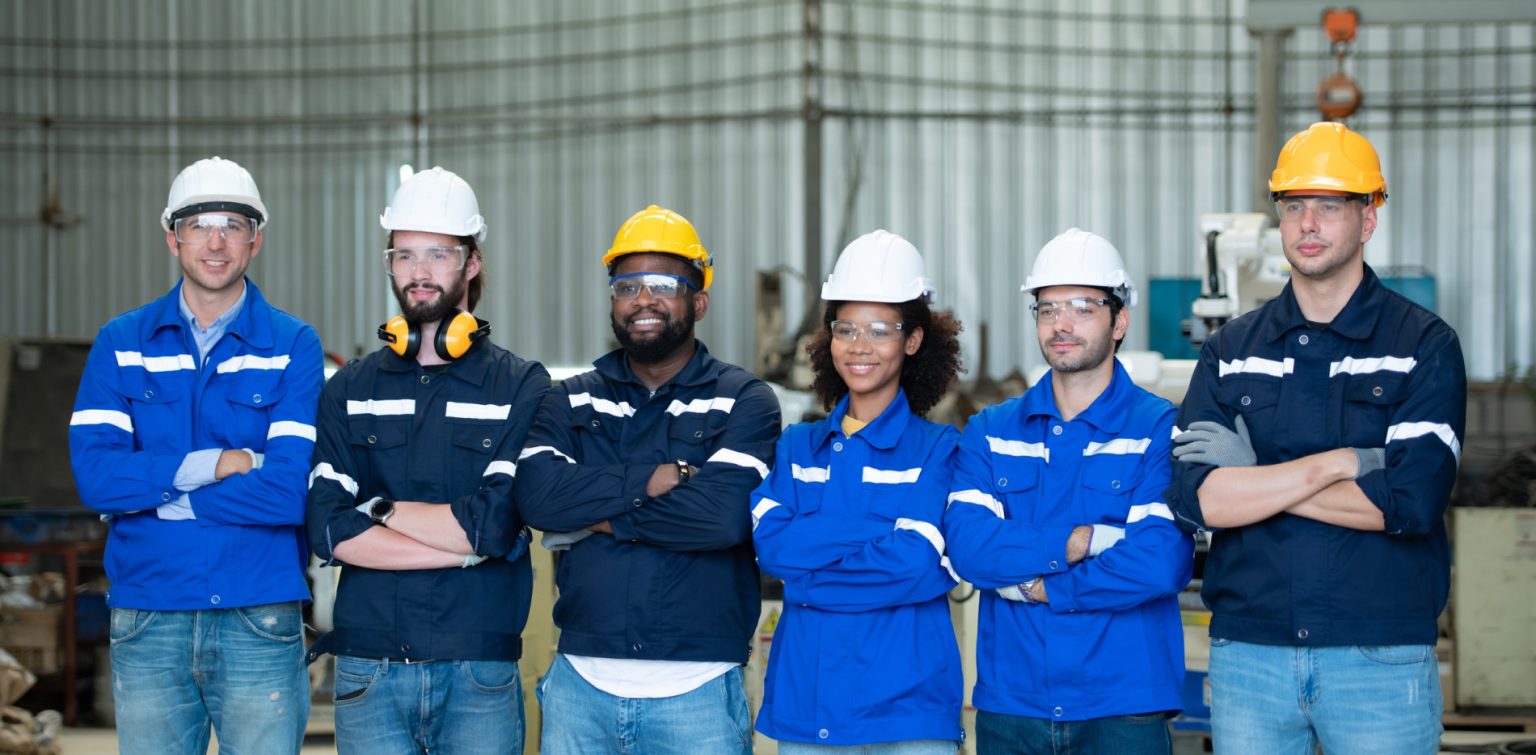 Group of emotional engineers who take pleasure in the achievement of the responsible project's work.